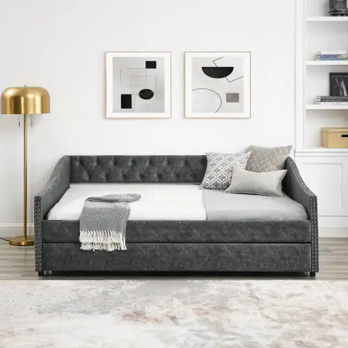 The Full-size Sofa Bed Features A Double-sized Upholstered Tufted Sofa Bed On Wheels