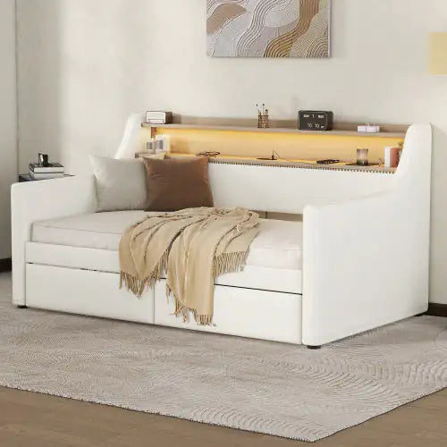 Sofá cama doble tapizado con LED y centro de carga